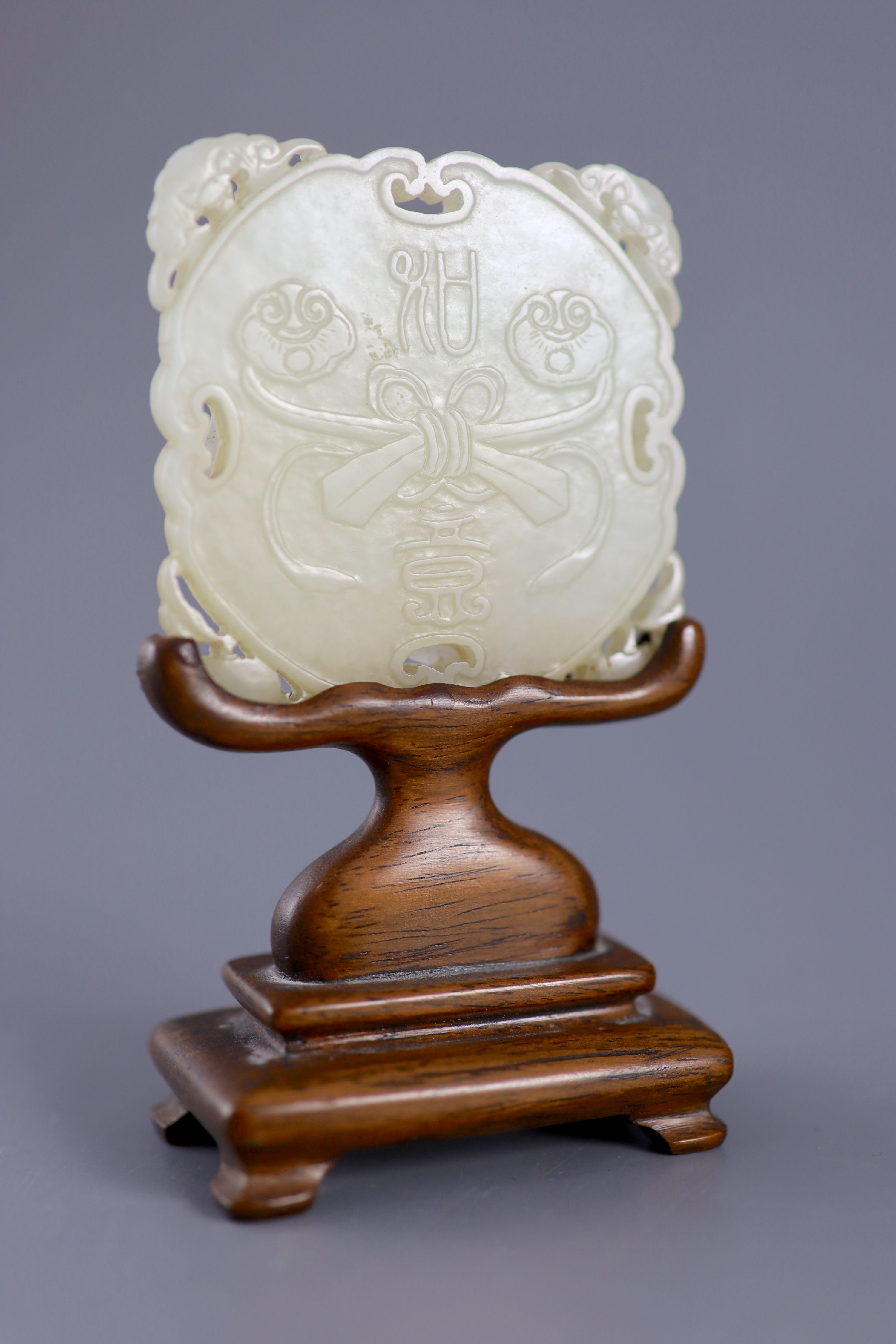 A Chinese pale celadon jade plaque, 19th century,